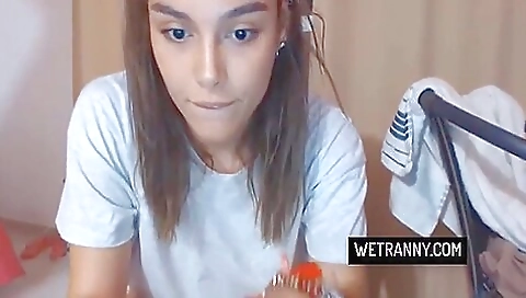 Amateur brunette with tattooed body showing off her tits