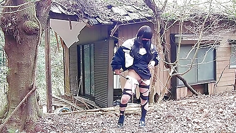 Trans girl pissing in an abandoned house in the forest
