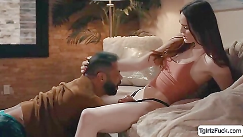 A sexy brunette with big tits is getting fucked in the ass