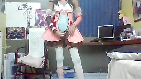 Latina brunette is wearing stockings and a black dress